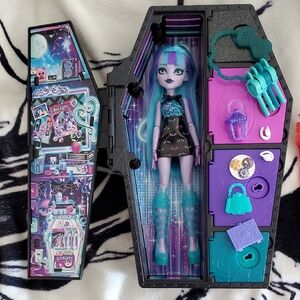 Mattel Doll with Black, Purple, and Teal Accessories